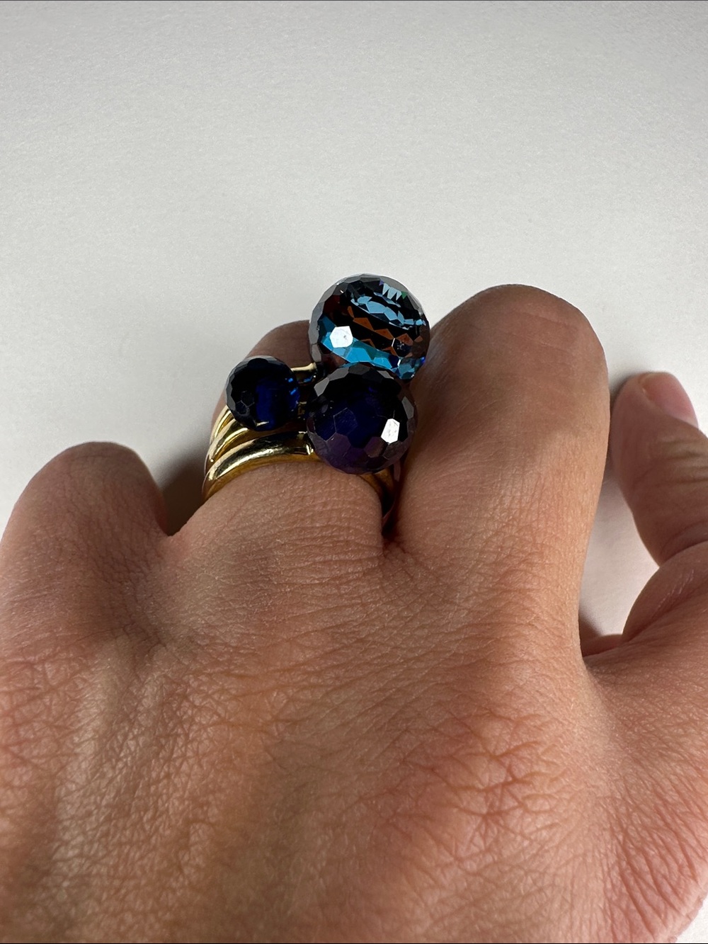 Henri Bendel Gold Ring Stack with Iridescent Blue-Purple Crystal Spheres